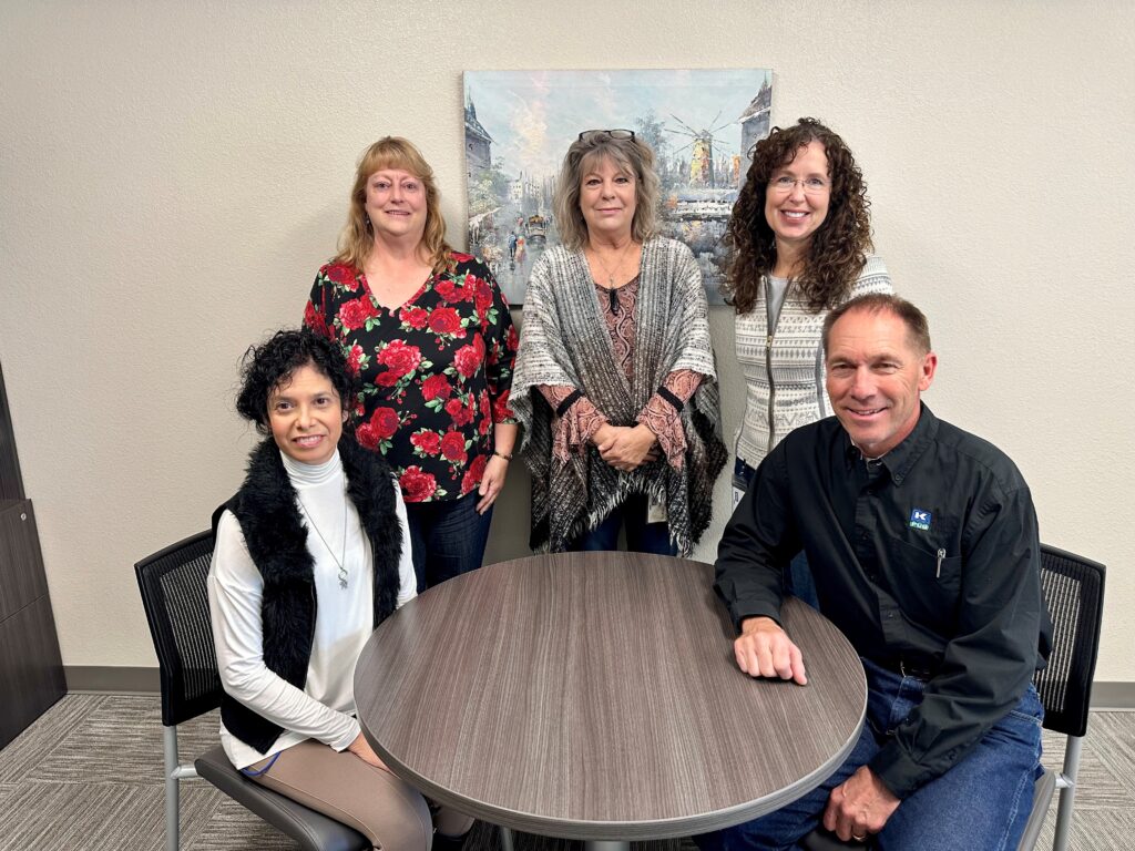 Photo cutline: KPUB Finance Department, L to R: Property Accounting Clerk, Nikole Lee; Accounting Supervisor, Jill Cook; Accounts Payable Clerk, Laura Robinson; Director of Finance, Amy Dozier; and Purchasing Agent, Damon Richardson