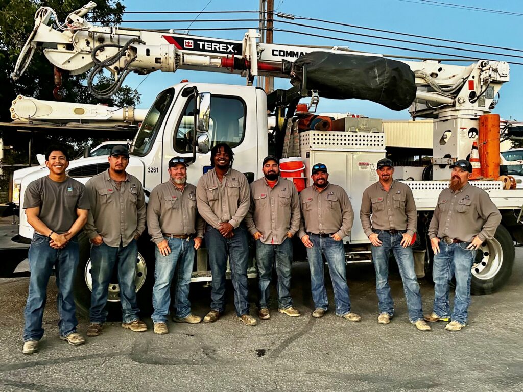 KPUB linemen heading to Georgia to restore power. Left to right: Joseph Buenrostro, Eric Hancock, Toby Geurin (crew leader), Nathaniel Crabtree, Justin Martinez, Jose Valdez, Josh Whitworth (crew leader), and Trey Owen.