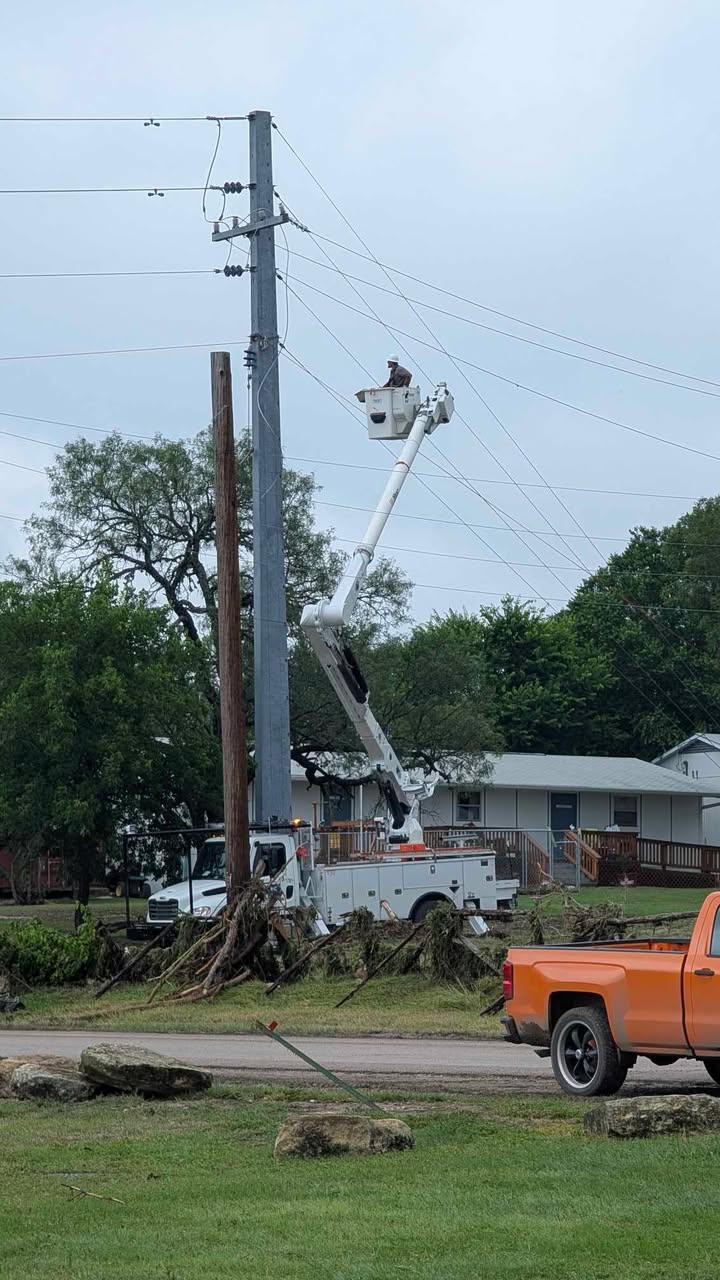 KPUB lineman, Justin Martinez, restores power in the Center Point area on July 5.