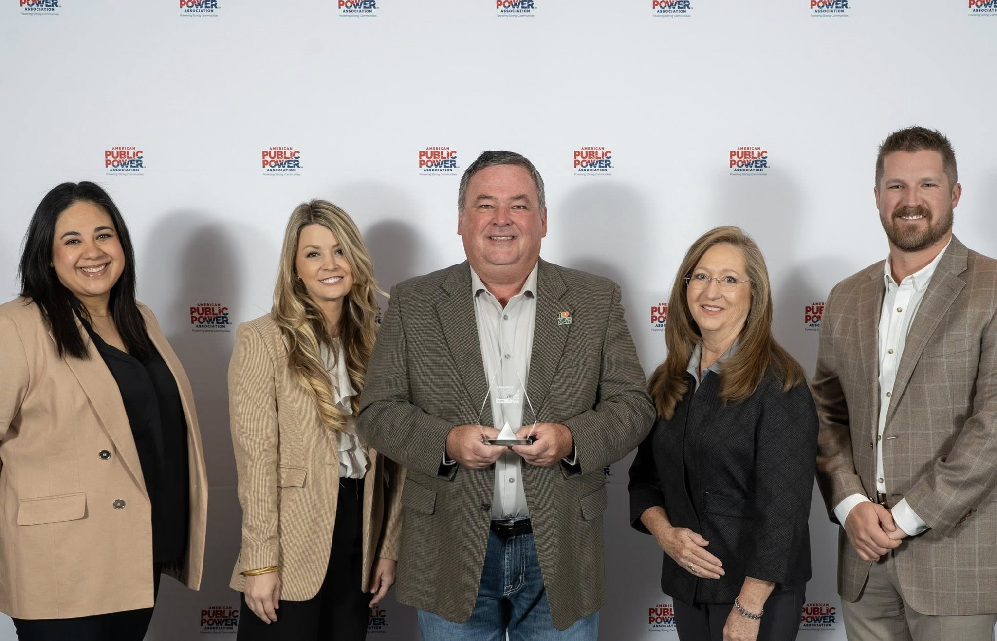 KPUB honored for outstanding customer service: (L–R) Asha Ramirez, KPUB Customer Service Representative Lead Coordinator; Allison Bueche, KPUB Director of Customer & Community Relations; Mike Wittler, KPUB General Manager & CEO; Jo Anderson, KPUB Supervisor of Customer Service; and DJ Owens, KPUB Energy Services Manager. Wittler holds KPUB’s Public Power Customer Satisfaction Award, presented by the American Public Power Association (APPA) at the 2025 Customer Connections Conference in Salt Lake City, Utah. 