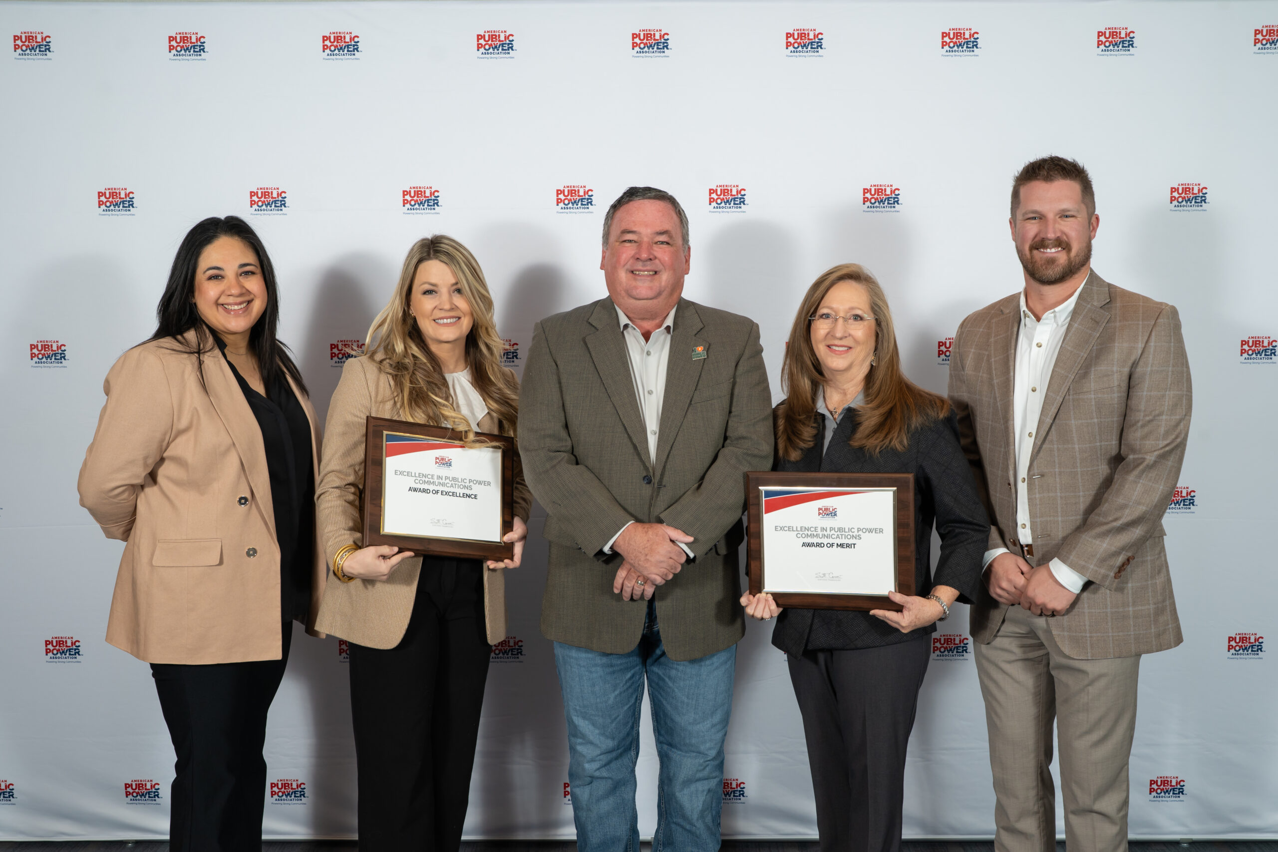 KPUB recognized for excellence in communications: (L–R) Asha Ramirez, KPUB Customer Service Representative Lead Coordinator; Allison Bueche, KPUB Director of Customer & Community Relations; Mike Wittler, KPUB General Manager & CEO; Jo Anderson, KPUB Supervisor of Customer Service; and DJ Owens, KPUB Energy Services Manager. Bueche and Anderson hold KPUB’s Excellence in Public Power Communications Awards for achievements in social media and video. 