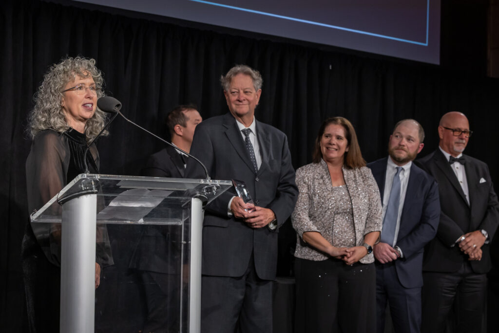 KPUB Assistant General Manager Amy Dozier speaks at The Bond Buyer Deal of the Year Awards Gala in New York City while accepting the Small Issuer Financing Deal of the Year award on the utility’s behalf. Photo by Donna Alberico.