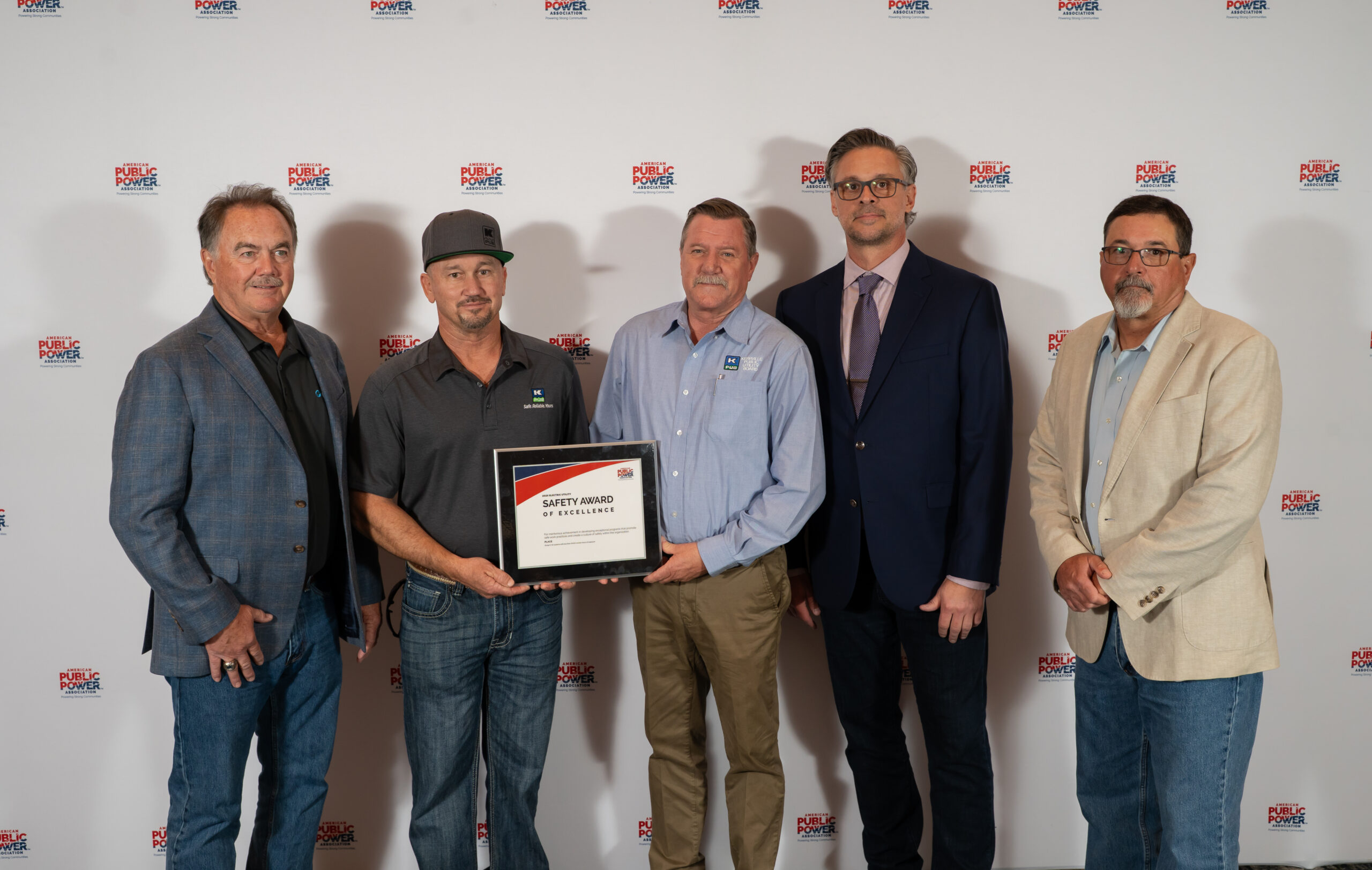 KPUB staff accept the 2025 Diamond-level Safety Award of Excellence at the APPA Engineering & Operations Conference. Pictured (from left) are Jon Beasley, Electric Cities of Georgia; Scott McKenzie; David Burley, KPUB Supervisor of Safety & Training; Larry Lee, KPUB Director of Operations; Travis Hoops, Omaha Public Power District; and Greg Labbe, American Public Power Association.